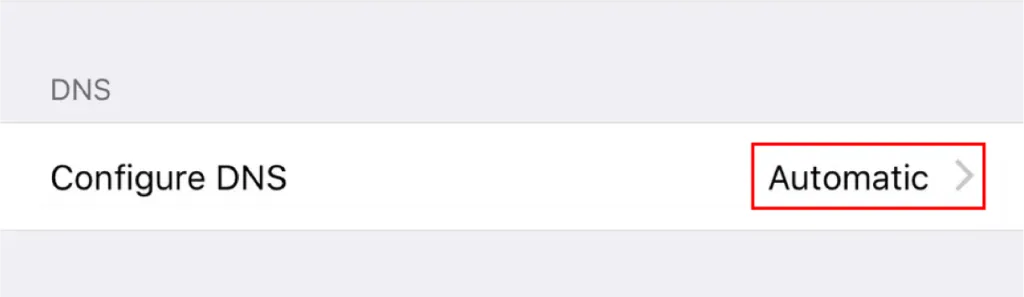 iPhone screen displaying the "Configure DNS" option in the Wi-Fi settings, currently set to "Automatic", allowing users to modify DNS settings for better performance and privacy.